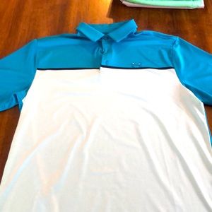 Men’s Under Armour polo. Large.